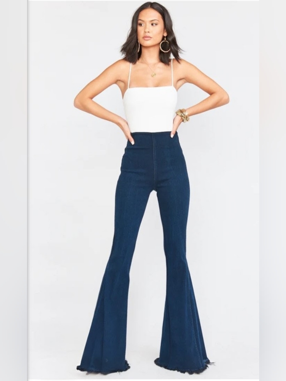 High-Rise Black Flare Jeans with Raw Hem